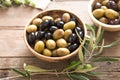 Fresh bowls with different kind of olives : green black kalamata olives with olive oil Royalty Free Stock Photo