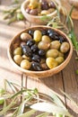 Fresh bowls with different kind of olives : green black kalamata olives with olive oil Royalty Free Stock Photo