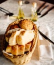 Fresh bread in basket. Slices roll breads in basket on table Royalty Free Stock Photo