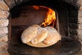 Fresh bread in front of the oven Royalty Free Stock Photo
