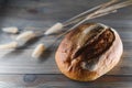Fresh bread isolated on a wooden background Royalty Free Stock Photo