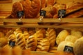 Fresh bread and rolls on the shelf in the store. Royalty Free Stock Photo