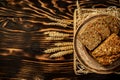 Fresh bread with seeds of goji berry and wheat on the wooden. healthy food concept. space for text. top view Royalty Free Stock Photo