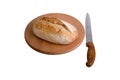 Fresh bread slice and cutting knife on table Royalty Free Stock Photo