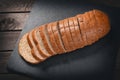Fresh bread slice on rustic table Royalty Free Stock Photo