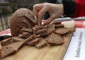 Fresh bread slices on rustic table. Pieces Homemade bread. Chopped Slices of bread. Bread background