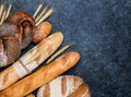 Fresh bread on table. Homemade bread. Kitchen or bakery poster design. Bread background