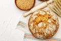 Fresh bread with wheat ears and a bowls of flour and grain Royalty Free Stock Photo