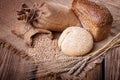 Fresh bread, wheat ears and grain Royalty Free Stock Photo