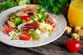 Fresh breakfast Omelette Salad with Parma Ham, feta cheese and vegetables