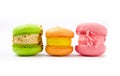 Fresh bright colored macaroons or macaroons isolated on white background. Royalty Free Stock Photo