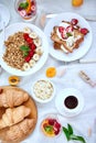 Fresh and bright continental breakfast table, abundance healthy meal variety