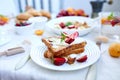 Fresh and bright continental breakfast table, abundance healthy meal variety