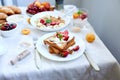 Fresh and bright continental breakfast table, abundance healthy meal variety crunch cereal, french toast, fruits, lemonade, coffee