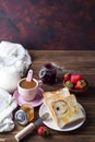 Fresh and bright continental breakfast table with jam on toast Royalty Free Stock Photo