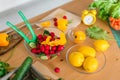 Fresh and bright cooking ingredients - vegetables, lemons and green salad Royalty Free Stock Photo