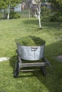 Fresh bright green grass, hay cut in a cart in the yard summer sunny day Royalty Free Stock Photo