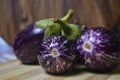 Fresh brinjal vegetable on chopping board