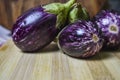 Fresh brinjal vegetable on chopping board