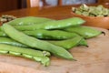 Fresh broad beans fava on wood table Royalty Free Stock Photo