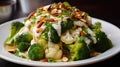 Fresh broccoli and cauliflower salad with Tahini dressing on plate Royalty Free Stock Photo