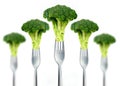 Fresh broccoli on fork isolated on white Royalty Free Stock Photo