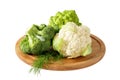 Fresh broccoli, romanesco and cauliflower on wooden board isolated on white Royalty Free Stock Photo