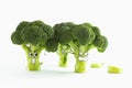 Fresh broccoli with scared cartoon style faces on white background Royalty Free Stock Photo