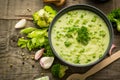 Fresh broccoli soup on the wooden table Royalty Free Stock Photo