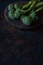 Fresh broccolini on a board