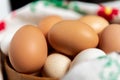 Fresh brown chicken eggs in wooden bowl. Royalty Free Stock Photo