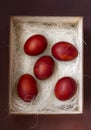 Fresh brown eggs and some straw in a wooden crate Royalty Free Stock Photo