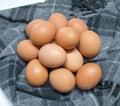 Fresh brown eggs uncooked from the farm Royalty Free Stock Photo