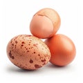 Fresh Brown Speckled Eggs on White Background CloseUp of Three Eggs One Cracked Open Royalty Free Stock Photo