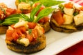 Fresh bruschetta with tomatoes cheese and basil Royalty Free Stock Photo
