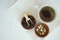 Fresh bubble hot black coffee in pure white ceramic cup on white wooden table, coffee love concept, copy space