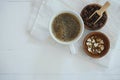 Fresh bubble hot black coffee in pure white ceramic cup on white wooden table, coffee love concept, copy space