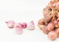 Fresh bunch of shallots and peeled shallots Royalty Free Stock Photo