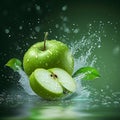 Fresh burst Water splashing on a green apple and cut slice Royalty Free Stock Photo