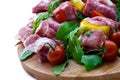 Fresh butcher cut and tomatoes meat assortment garnished Royalty Free Stock Photo