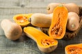 Fresh butternut squash on the wooden table