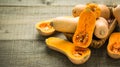 Fresh butternut squash on the wooden table