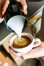 Making cappuccino: latte art Royalty Free Stock Photo