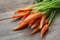 fresh carrot bunch on wood