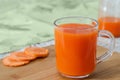 Fresh carrot juice in glass Cup.