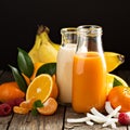 Fresh carrot, orange and coconut juices Royalty Free Stock Photo