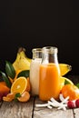 Fresh carrot, orange and coconut juices Royalty Free Stock Photo