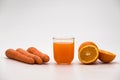 Fresh carrot and orange juice - detox fruit and vegetable organic juice Royalty Free Stock Photo