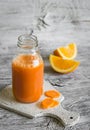 Fresh carrot-orange juice in a glass bottle Royalty Free Stock Photo