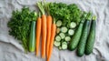 Fresh Carrots, Cucumbers, and Zucchini on Linen Fabric Royalty Free Stock Photo